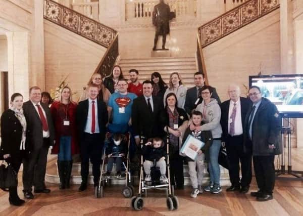 Edele Doherty, third from the right, pictured with a group of parents of children with autism who travelled to Stormont earliers this week to hand in a petition demanding better access to services for those with the condition.
