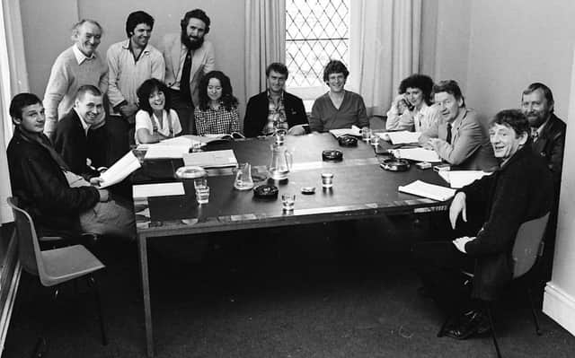 AUGUST, 1980 . . . . Hollywood star, Liam Neeson, seated far left, pictured with the cast of Brian Friels Translations during a read through before the play was premiered in Derrys Guildhall.
