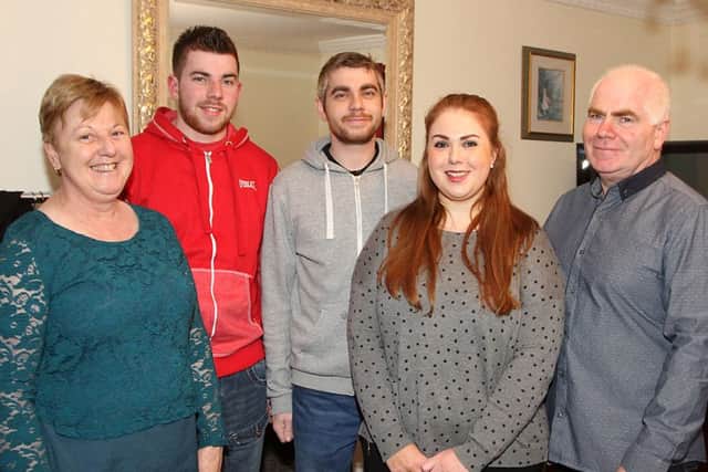 Sean McKeever (centre) at home with family members Eileen (mum), Micheal (brother), Patricia (sister) and dad Gerard at home following the operation last November which saw Sean receive one of his fathers kidney's. INLV0816-168KDR Photo: Ken Reay