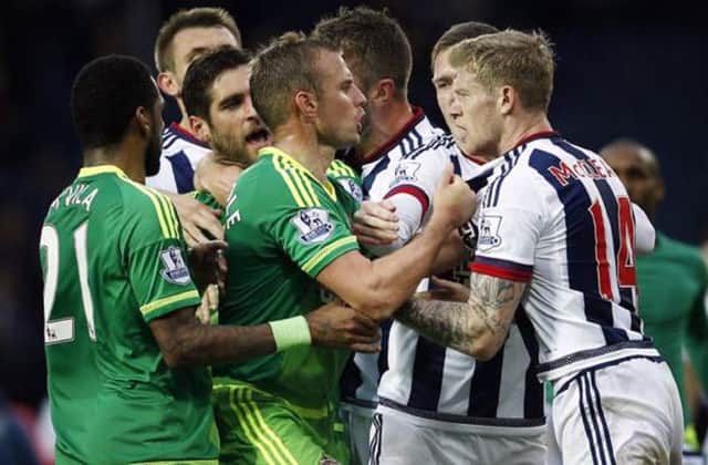 James McClean (right) escaped with a warning from the English F.A. after celebrating West Brom's 1-0 win in front of Sunderland fans this season.