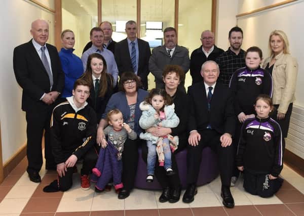 Sports Minister CarÃ¡l Ni Chuilin and deputy First Minister Martin McGuinness  with representatives from Causeway Council  and local sports clubs in Dungiven last month. Picture: Michael Cooper
