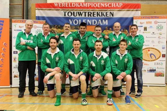 Inishowen duo Adrian Lynch and Paul Duffy with members of the Irish  680kg category squad which claimed  Bronze medals at the World Championships in Holland.