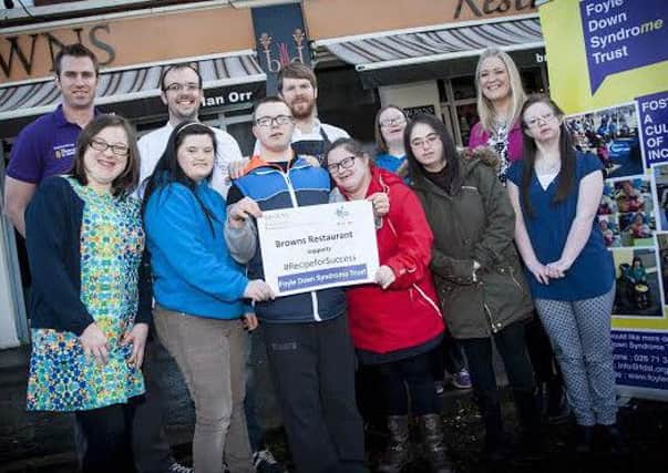Members of the Foyle Down Syndrome Trust pictured with Ian Orr and other staff members of Brown's Restaurant as they launch the campaign for votes for their 'Recipe for Success' project.