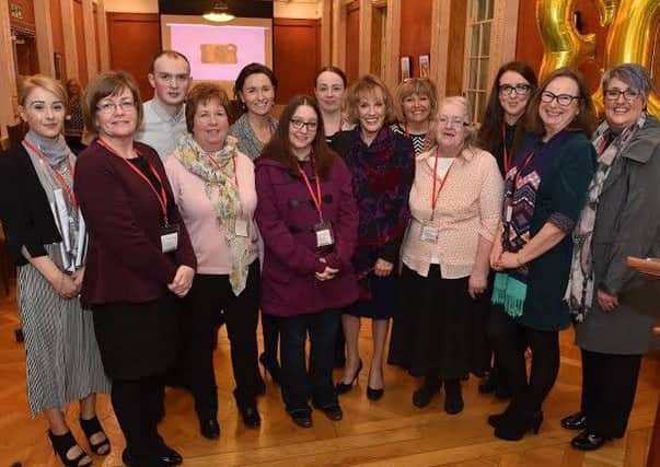 From left, Derry Childline volunteers, Aimee Wilson, Dorothy Breslin, Matthew Fitzgerald, Helen Duffy (staff), Roslyn Farr, Rebecca Lovell
Louise Connolly (staff), Dame Esther Rantzen, Catherine McIvor
Fiona Simpson, Sarah Carlin, Annette Wright and Julieann Armstrong pictured with Dame Esther Rantzen in the Long Galley at Stormont. Photo, Simon Graham, Harrison Photography.