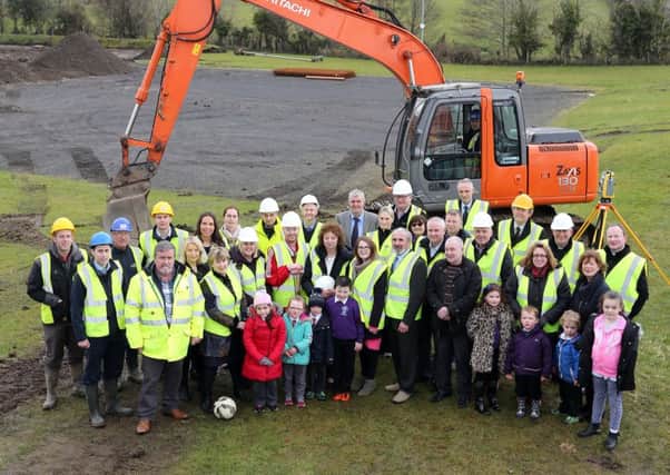 Sports Minister Caral N Chuiln cuttting the first sod to mark the beginning of work on new Â£2.8million sports facilities for Dungiven. Included are local political representatives, contractors and members of the local community. Photo Lorcan Doherty Photography