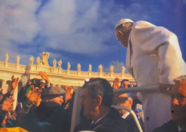 Derry man Sean Mulrine shakes the hand of Pope Francis in Rome.