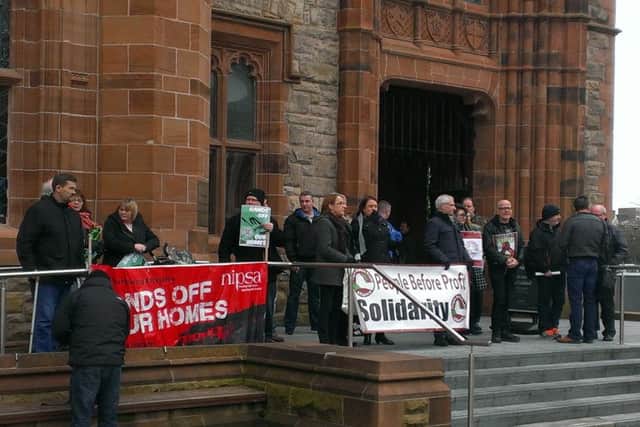 Protesters gathered outside the Guildhall on Thursday afternoon.