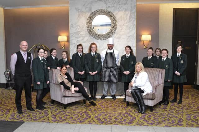 St Cecilias College teachers Mrs Anna Scullion (seated left) and Mrs Niamh Desmond (seated right) with students from years 10, 11 and 12 on a work experience visit to the Everglades Hotel that included an overnight stay on Thursday last. Included in the picture are Neil Devlin hotel General Manager and Colman ODriscoll hotel Head Chef. DER0816GS038