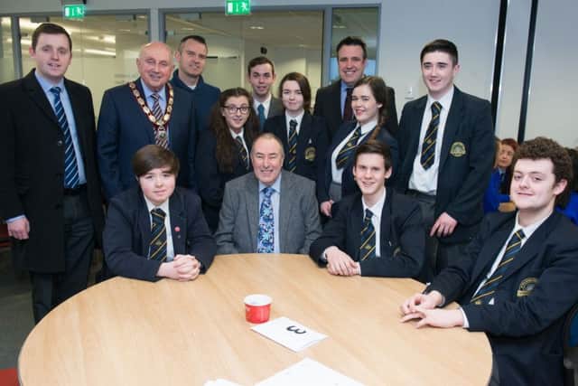 Pictured at the Lets Talk Politics Foyle-East Londonderry Constituency event in the Holywell Trust are elected representatives, Gary Middleton MLA,  DUP, the Deputy Mayor, Councillor Thomas Kerrigan, Councillor Michael Cooper, Sinn Fein, Steven Parkhill, UKIP, Gerard Diver MLA, SDLP and Assembly Speaker, MItchell McLaughlin, with pupils from Lumen Christi College. Picture Martin McKeown. Inpresspics.com. 26.02.16