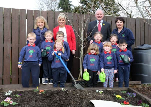 The deputy First Minister Martin McGuinness and Agriculture Minister Michelle O'Neill and pupils planting a tree in the grounds of Orchard Community Playgroup in Ballykelly. Included are Gail Downey, DARD staff member, and Tara Del Cooper, playgroup leader. DARD staff were taking part in a spring-clean at the playgroup.

Photo Lorcan Doherty Photography