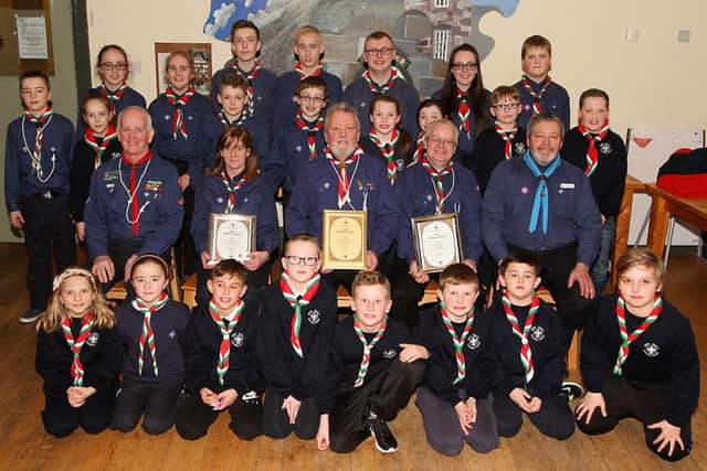 25th Derry Scouts this week leaders Kevin King with the Gold Meritorious Award, Mary Owens with her Silver Meritorious Award and Pat McLaughlin with his Silver Meritorious Award received this week. Included are Dessie Taylor - Regional Commander and Kevin Ferguson the Provincial officer and members of the groups Beavers, Cubs and Scouts . INLV0916-036KDR