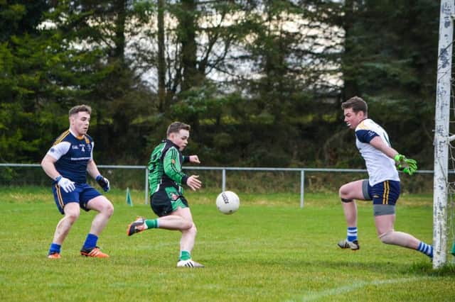 St. Colmb's College All Star keeper Dylan Doherty makes a crucial save during Friday's MacLarnon Cup semi-final against Holy Trinity in Drumragh.