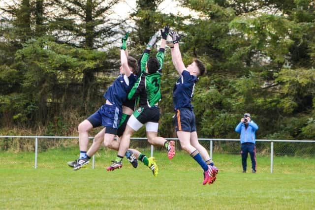 St. Columb's College Conor Feeney wins a high ball during Friday's MacLarnon Cup semi-final aginst Holy Trnity College.