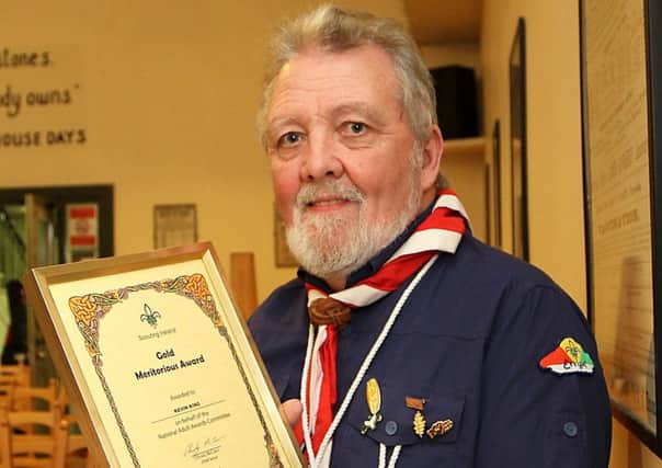 25th Derry Scouts leader Kevin King from Limavady is delighted after receiving the Gold Meritorious Award for his service to the organisation over the last 34 years. INLV0916-044KDR photo: Ken Reay