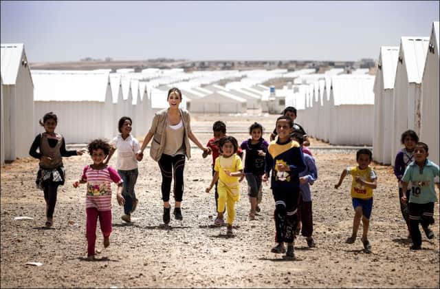 Syrian efugee children from the Azraq refugee camp, Jordan, pictured with Irish ambassador for World Vision Irelands Survive to Five campaign, Roz Purcell, last May.
