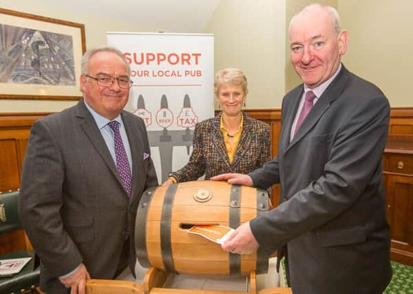 Foyle MP Mark Durkan sending his Message in a Barrel to George Osborne calling for a cut in beer duty ahead of this months Budget.