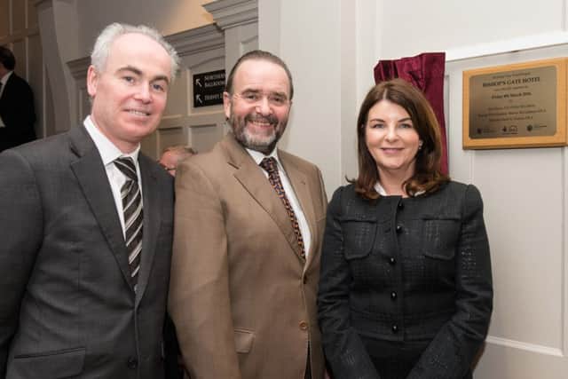 Manus Deery, Assistant Director, Historic Environment Division, DOE, John Meehan, Chairman of the Inner City Trust and Sinead McLaughlin, Chief Executive, Londonderry Chamber of Commerce pictured at the opening of the new Bishop's Gate Hotel. Picture Martin McKeown. 04.03.16