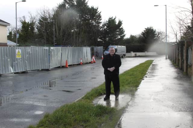 Councillor Tony Hassan on the Upper Galliagh Road access point to hundres of home in the area