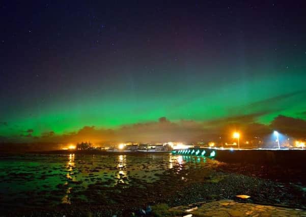 The aurora turns the sky above Malin Town green. Photo: Bren Whelan/Wild AtlanticClimbing.ie