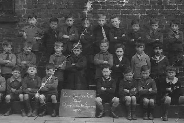 Alfie White, as a school child,  is pictured fourth from the right on the  back row.