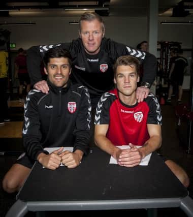 Derry City first team coach Donal O'Brien pictured withCristian Delgado (Spain) and Niclas Vemmelund (Denmark) when the players were unveiled at the Foyle Arena last January. DER0116MC015