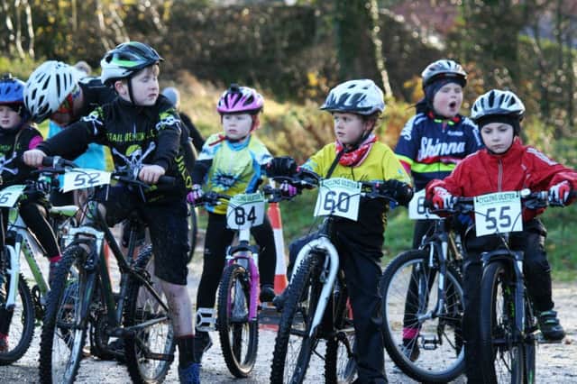 A group of young cyclists enjoying last year's 'Sprocket Rockets' programme in St. Columb's Park