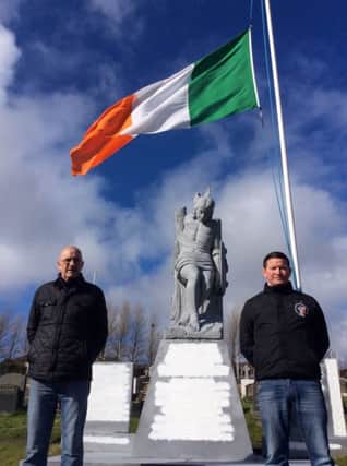 Councillor Colly Kelly with Derry Republican Ritchie Harkin at the restoration work taking place at  the Republican plot in the City Cemetery.