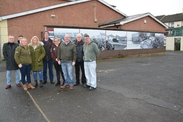 Group pictured at the erection of the new mural in Creggan.