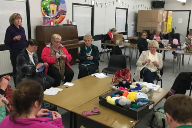 Members of the craft group in the current centre in Magilligan.