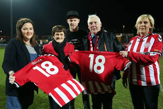 Â©/Presseye.com - 11th March 2016.  Press Eye Ltd - Northern Ireland - Airtricity League Premier Division - Derry City V Cork

Ireland international James McClean and Karen Pyne, Brandywell Pride Supporters Club presenting the No 18 jersey to Terri-Louise Farren, Michael and Kathleen Farren, wife & parents of the late Mark Farren, as the number is retired in memory of the Derry striker.

Mandatory Credit Photo Lorcan Doherty / Presseye.com