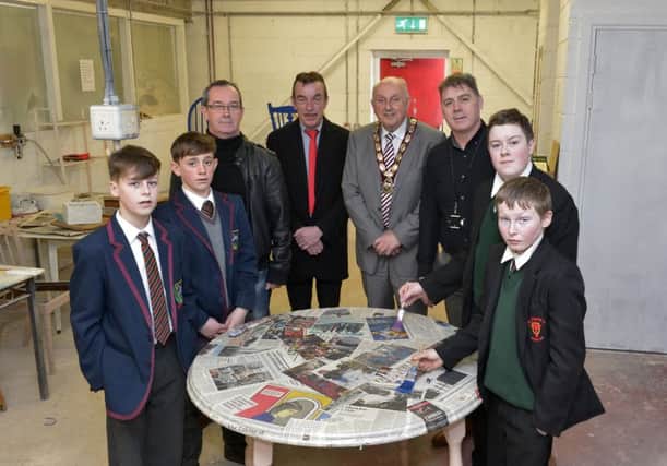 Aaron Rush (on the left) and Joseph McGonagle from Oakgrove Integrated School. Eddie Breslin Good Relations Officer Northern Ireland Housing Executive, Noel McNulty Housing Services Manager Northern Ireland Housing Executive, the Deputy Mayor of Derry and Strabane Alderman Thomas Kerrigan, Joe Brolly manager 4rs Reuse Workshop Pennyburn, Ethan Shiels and Eoin Coyle from St Josephs Boys School pictured recently at a NIHE Community Cohesion funded project for young people at 4rs recycling workshop.  DER1116GS035