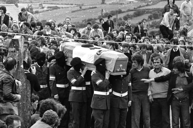 16th July 1981:  Masked IRA members lead the funeral procession of hunger striker Martin Hurson. He died after 46 days on hunger strike.