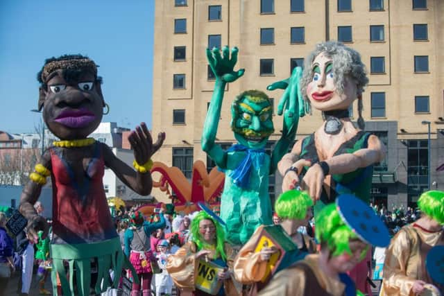 Giants figures tower over the carnival who took part in the annual Derry City and Strabane District Council St. PatrickÃ¢Â¬"s Day parade which attracted thousands of spectators along the route. Picture Martin McKeown. Inpresspics.com. 17.03.16