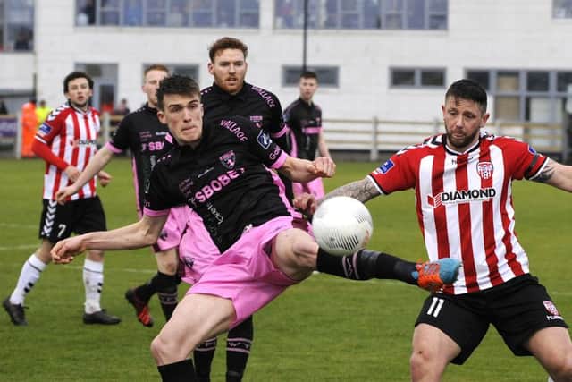 Wexford Youths Ryan Delaney V Derry City's Rory Patterson. Pic: Jim Campbell