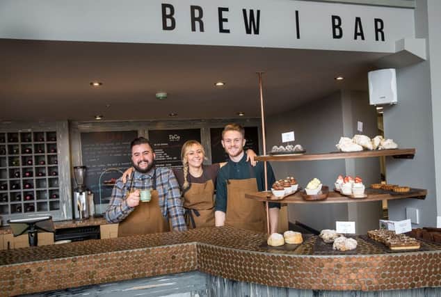 Brewing up a storm . . . Pictured, from left, are RoCo Brew Bar Manager Andrew McSparran with baristas Miriam Molloy and Gareth McFarland.submitted