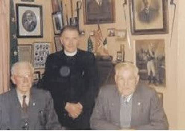 Father O'Kane with veteran Republicans Seamus Dobbin and Eddie Boyle
