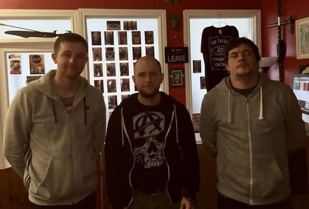 Tattoo artists Shaun Griffin, Michael Kelly and Aaron Mitchell from the Tattoo Lounge in Derry.