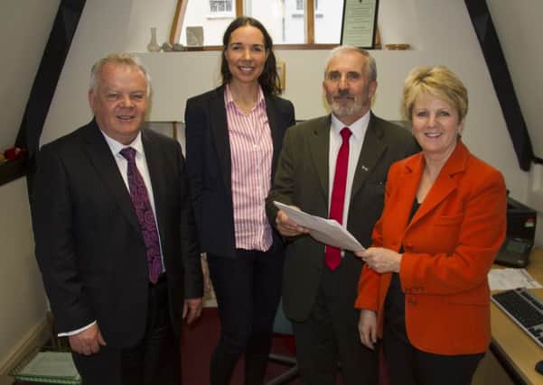 Gerry Mullan with Colr. Stephanie Quigley and retiring MLA John Dallat and deputy returning officer Patricia Murphy.