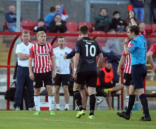 Derry's Conor McCormack is sent off by match referee Robert Harvey during the club's last meeting against Dundalk at Brandywell last season.