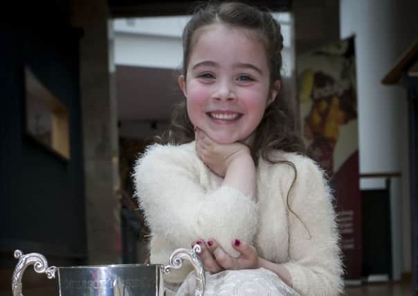 Shannon Kerr, winner of the Kathleen Henderson Cup for Piano u-8 at Feis Dhoire Cholmcille. DER1316MC037