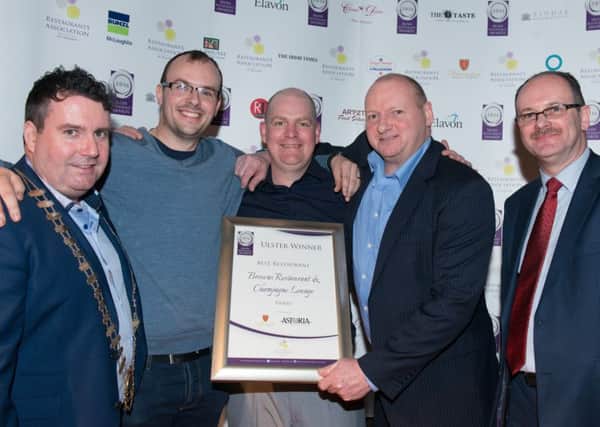 President of RAI, Anthony Gray, Ian Orr (Browns Restaurant), Paul Twells, Chris Thompson and William Doherty of Dalcassian Wines & Spirits, Astoria Wines at the Ulster regional awards of the Irish Restaurant Association Awards which were held in the Guildhall recently.