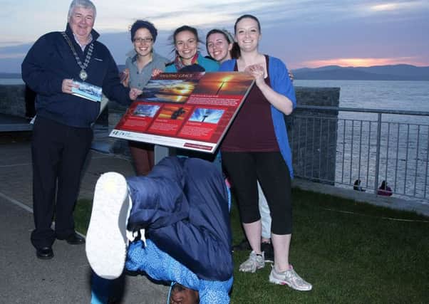 Councillor Nicholas Crossan pictured at the opening ceremony of this year's Amazing Grace Festival at the Shorefront, Buncrana with Bekah Schulz, Liv Calder, Mirelle Patrey and Susie Garvey-Williams. DER1415MC052