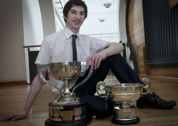 Michael Logue, 1st Piano o-16 (Lecky Cup); 1st Instrumental Repertoire (George White Cup) & and Bursary o-16 at Feis Dhoire Cholmcille. DER1316MC107