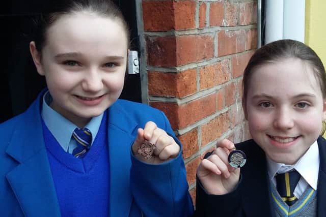 Amy Hutcheon (left) Foyle School of Speech and Drama and St Mary's College who was placed third in the Young People's Verse, aged 11 and under 12, with her cousin Lucy Healy, Lumen Christi College, silver medal in Irish Verse, Year 8.