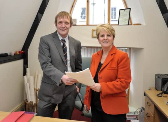 Cannabis Is Safer Than Alcohol (CISTA) Assembly Elections candidate John Lindsay pictured with Deputy Returning Officer Patricia Murphy when he handed in his nomination forms on Wednesday last. DER1416GS031