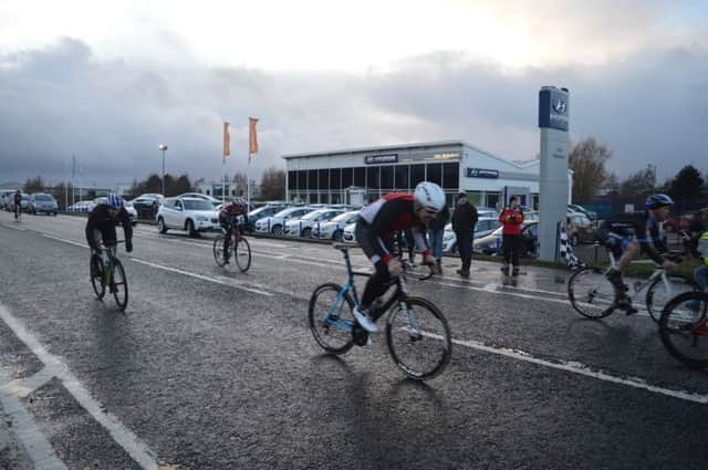 Riders cross the finish line on Wednesday night in Campsie. 0804MW01
