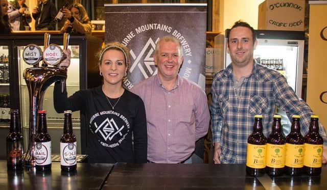 Michael and Shaun O'Connor with Ciara McGreavy of Mourne Mountain Brewery (SeanCampbell2014)
