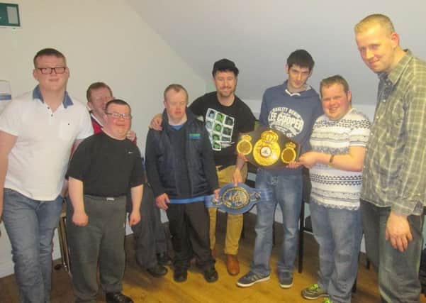 Destined members Liam Toland, Ryan Forrest, John Murphy, Paul Donaghy, Gavin Mc Ateer, Kevin Burke, Owen Conway with Dungiven boxing champ turned barber, Paul McCloskey.