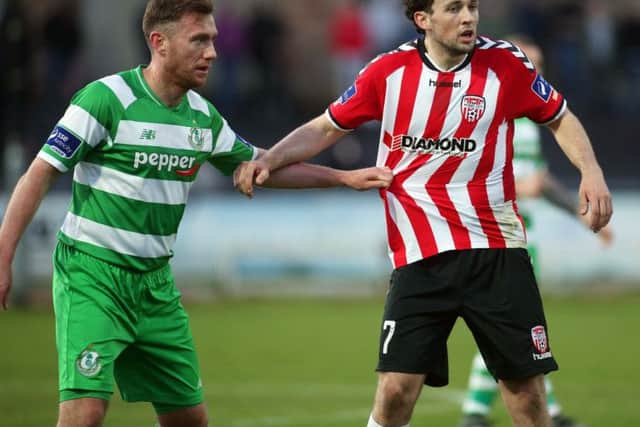 Â©/Presseye.com - 8th April 2016.  Press Eye Ltd - Northern Ireland - Airtricity League Premier Division - Derry City V Shamrock Rovers

Derry's Barry McNamee and Shamrock Rovers' Patrick Cregg.

Mandatory Credit Photo Lorcan Doherty / Presseye.com