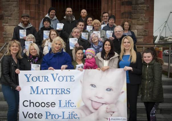 YOUR VOTE MATTERS. . . .Members of Precious Life pictured at the Guildhall yesterday afternoon. DER1516MC005